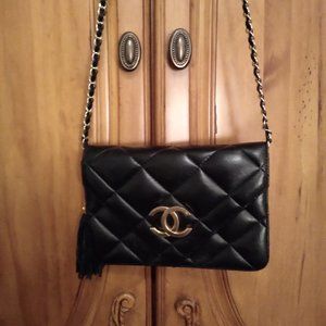 Chanel black bag with tassel